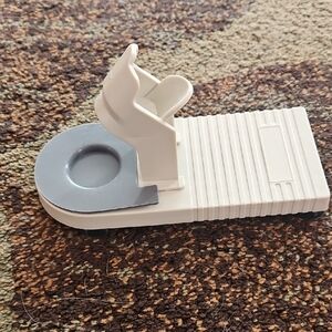 Gray and White Plastic Holder